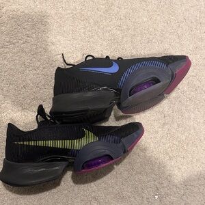Nike Black Training Shoes with Blue Swoosh and Purple Accents